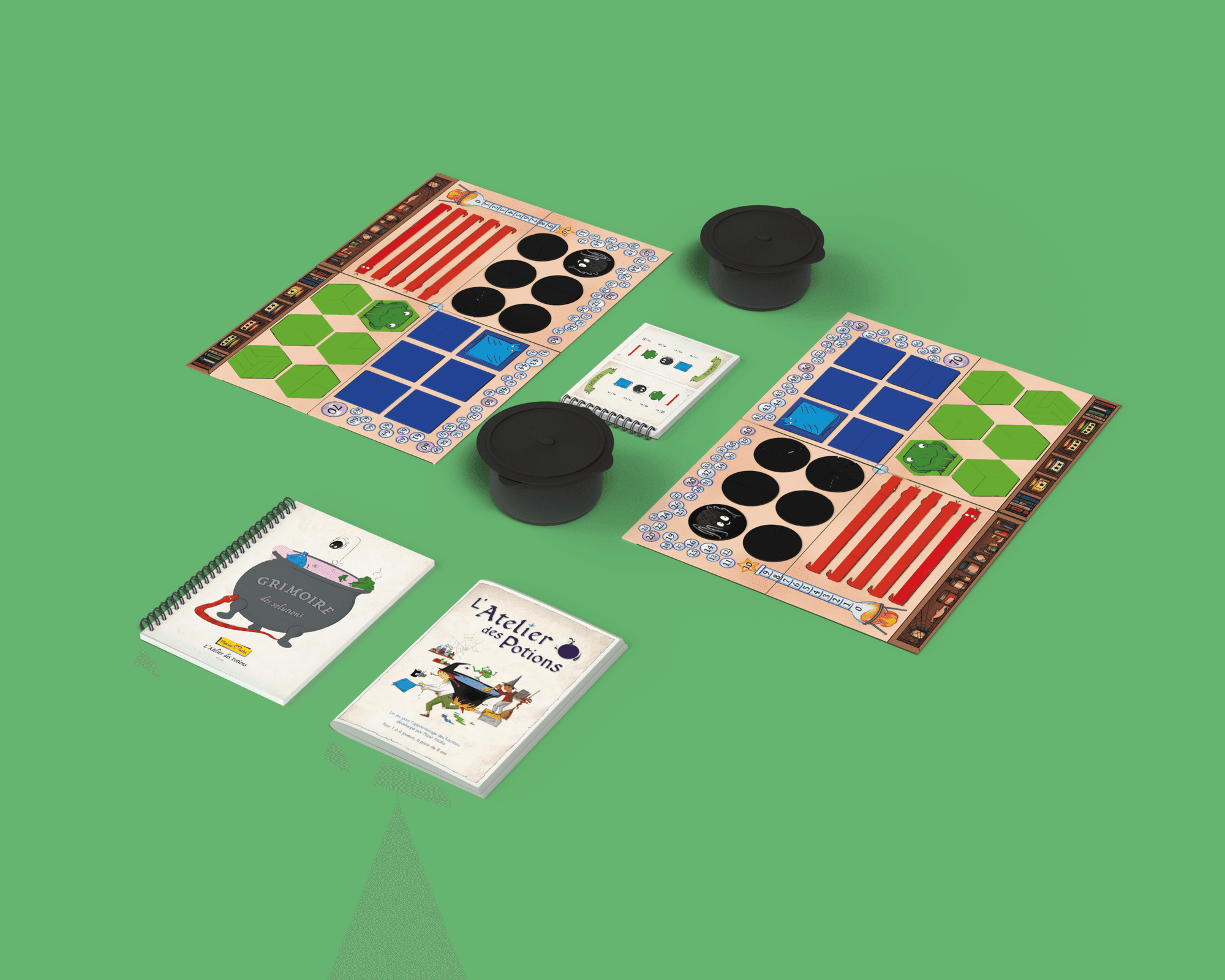 Deux plateaux de L'Atelier des Potions installés côte à côte avec leurs chaudrons, le livret de cartes et le grimoire des solutions